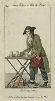 Trickster: Magician performing the cup and balls trick