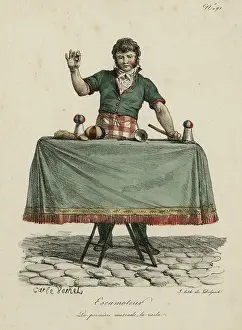 Trestle: Magician performing trick on table with cup and balls