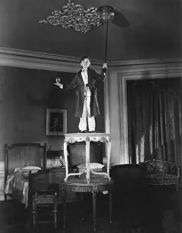 Precarious: The magician prepares to entertain