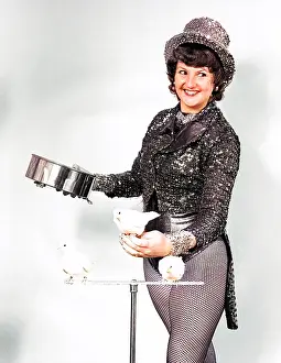Thighs: Magician with three white doves