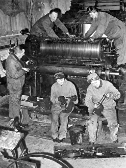 Flatbed: Maintenance on a printing machine, 1943