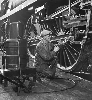 Heinz Zinram: Maintenance worker greasing pivots and slides