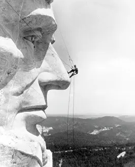 Rushmore: A maintenance worker on the nose of Mount ?