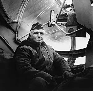 Bsloclcgr: Maj. Gen. Simon Bolivar Buckner in a cockpit of