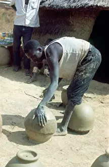 Pots: Making pots without a wheel. Nigeria circa 1966