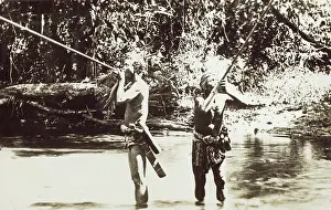 Sheaths: Malaysia - Men from the Sohail Tribe using blow pipes