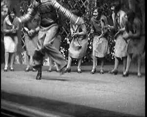 Clapping: A Male Actor Performing a Dance Routine In