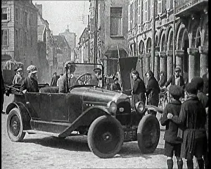 Executing: Male British Civilian Driving A Car Executing