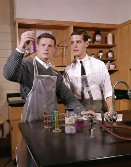 Progressing: Two Male College Students In Science