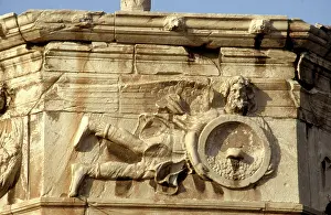 Plaka: Male figures on the Tower