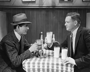 Supportive: Two male friends in caf
