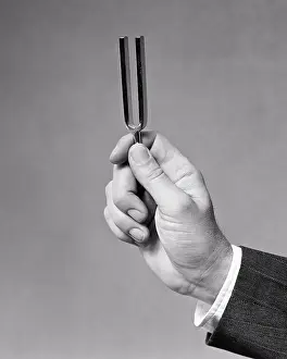 Resonator: Male Hand Holding