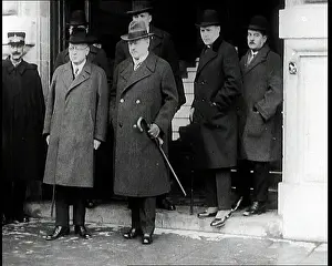 Admitted: Male Ministers Standing on the Steps of a Large