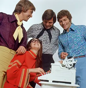 Naff: Three male models with female typist