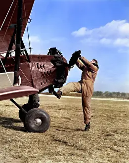 Propping: Male Pilot Trying To Turn Plane'S Propeller