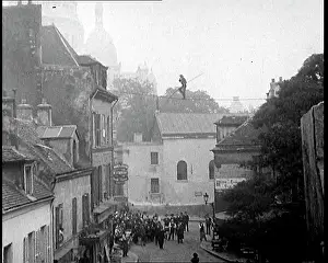 Montmartre: A Male Stuntman Walking a Tightrope Between