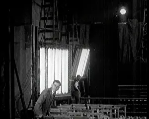 Technicians: Male Technicians At Work With Lights