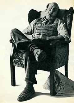 Dozing: Man asleep in a chair