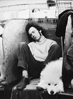 Amusing: Man asleep at a Dog Show