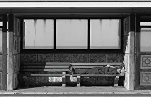 Tony Boxallfrps: Man asleep in a seaside shelter
