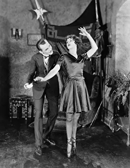 Advising: Man with ballerina en pointe
