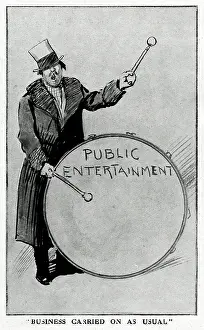 Banging: Man banging a drum to advertise public entertainment