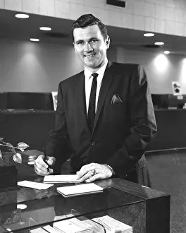 Receipts: Man At Bank Doing Business
