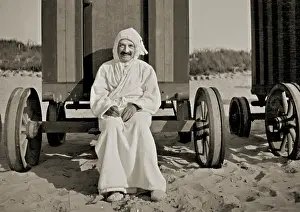 Towelling: Man in bath robe outside bathing hut