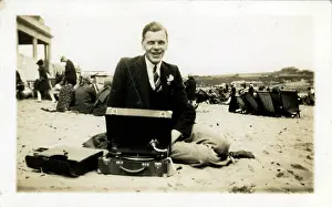 Portable: Man at Beach with Portable Gramophone