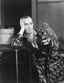 Pajamas: Man with bird perched on finger