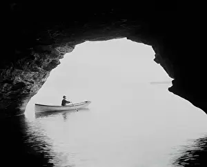 Pointe: Man - boat - cave - Lake Huron