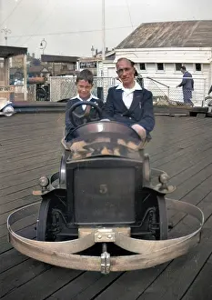 Dodgem: Man and boy in dodgem car