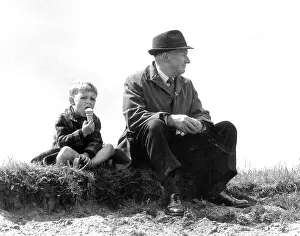 Trilby: Man and boy having a sit down