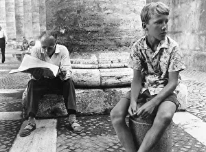Bollard: A man and a boy in St Peter's Square, Rome