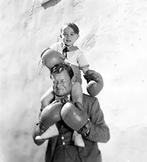 Grimace: Man and boy wearing boxing gloves