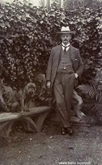 Unwin: Man with a bulldog in a garden