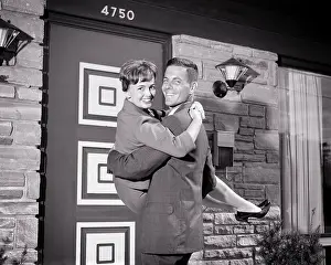 Threshold: Man About to Carry the Woman Over the Threshold