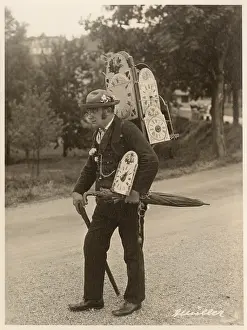 Eccentric: A man carrying a back pack full of clock faces