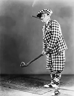Outrageous: Man in a checkered golf outfit