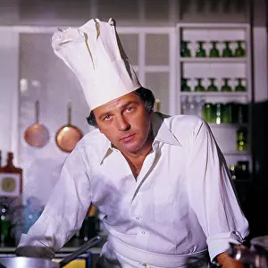 Exasperated: Serious Man Chef Wearing Toque in Restaurant Kitchen