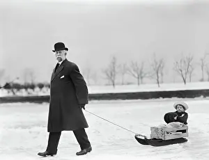 Chops: Man - Child - Sled - Winter - Snow