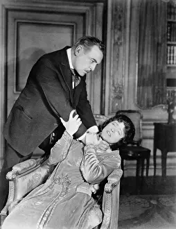 Strangling: Man choking woman