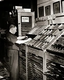 Compositor: Man composer setting type by hand