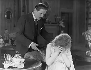 Supportive: Man consoling crying woman
