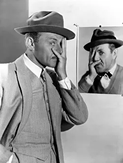 Illusions: Man copying himself in a portrait