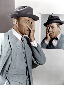 Illusions: Man copying himself in a portrait