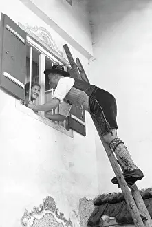 Climbs: Man in costume when Fensterln (windowing)