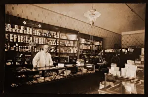 Toned: Man behind counter in grocery store