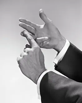 Reasoning: Man Counting Enumerating Items on his Fingers