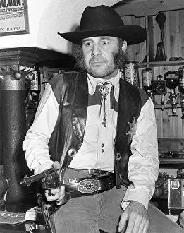 Bootlace: Man in cowboy outfit, Hayle, Cornwall